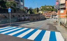 San Michele: le strisce pedonali con i colori del paese